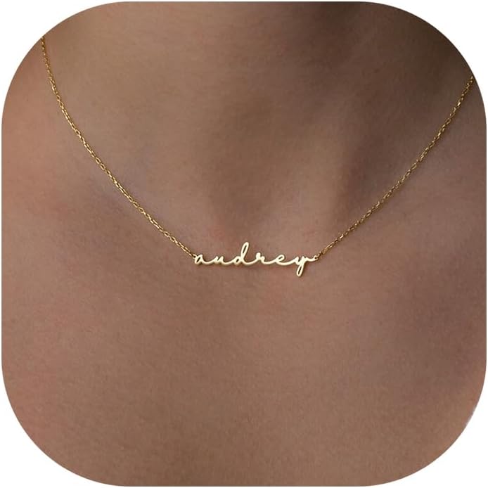 Gold name necklace with 'audrey' on a fine cable chain